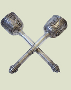 two solid silver maces